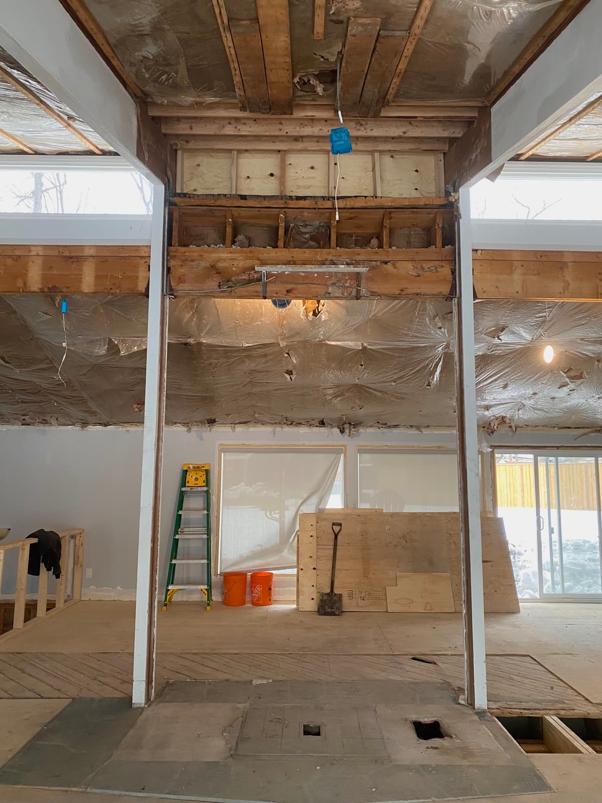 Main floor opened up with ceilings and floors removed
